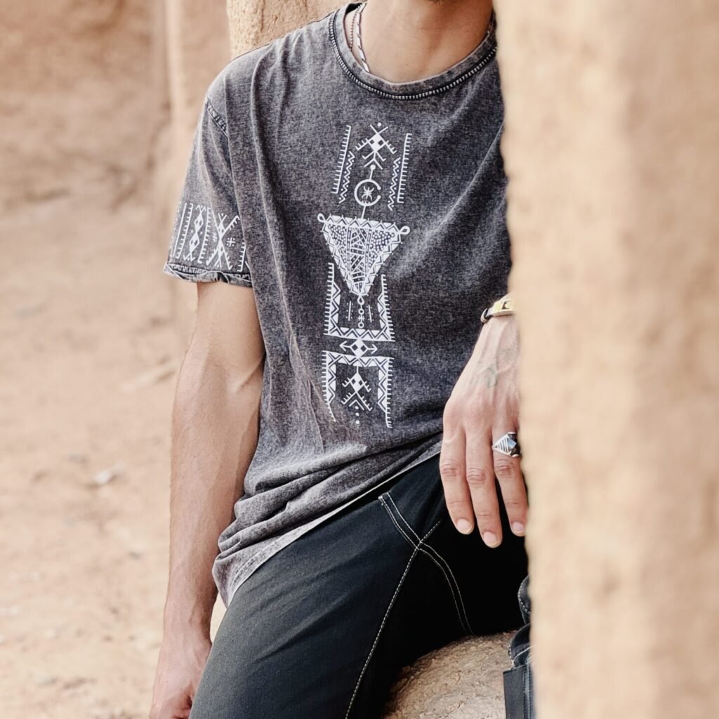 Black Moroccan heritage-inspired T-shirt featuring a distinctive cultural graphic design