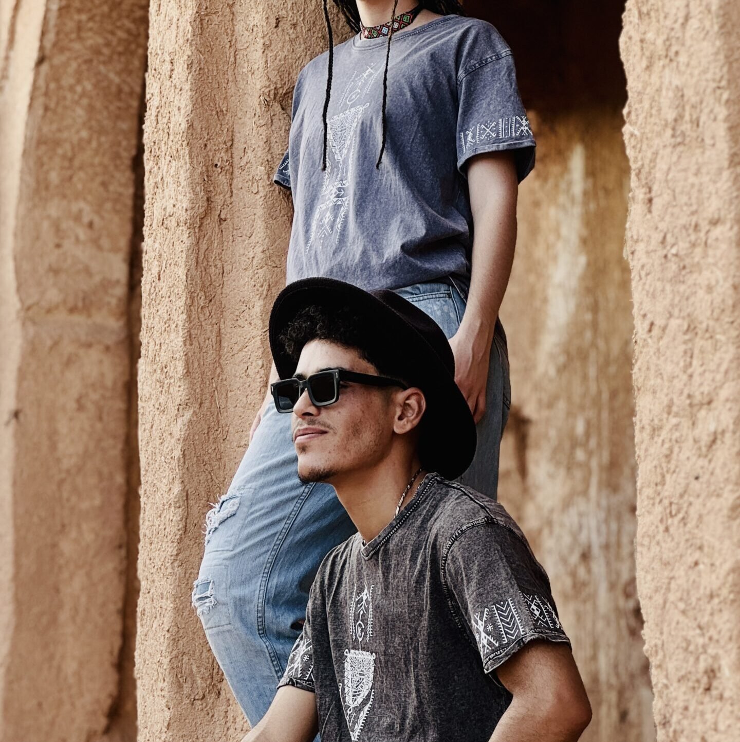 Black and light blue Moroccan heritage-inspired T-shirt with a distinctive graphic design