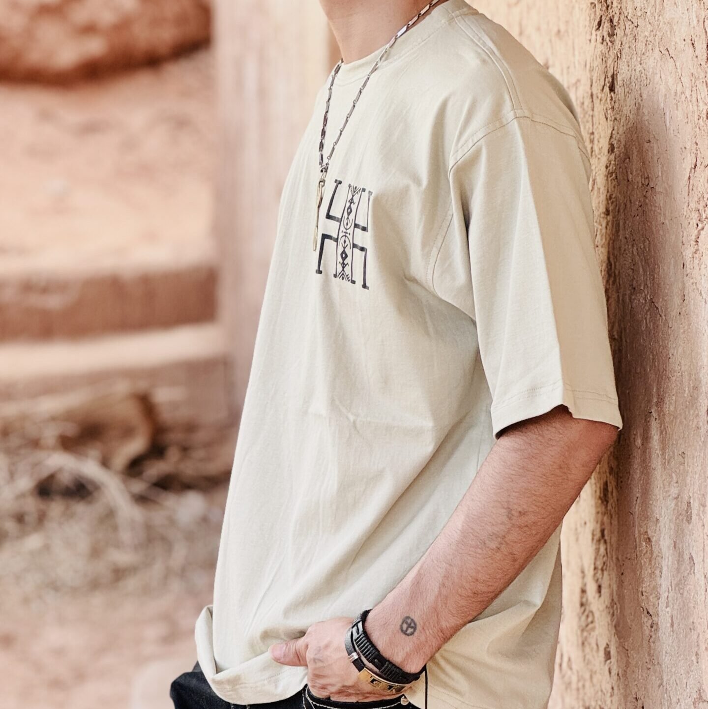 Moroccan Amazigh-inspired T-shirt featuring a distinctive cultural graphic design