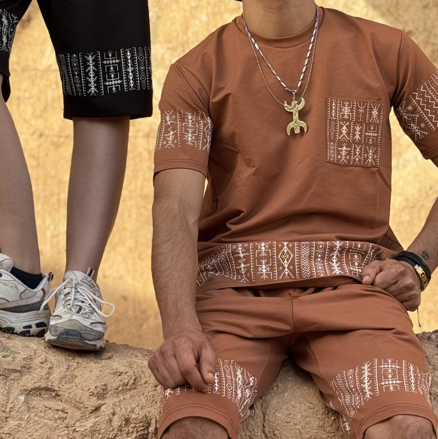 Black and terracotta Amazigh two-piece outfit with embroidered T-shirt and matching shorts