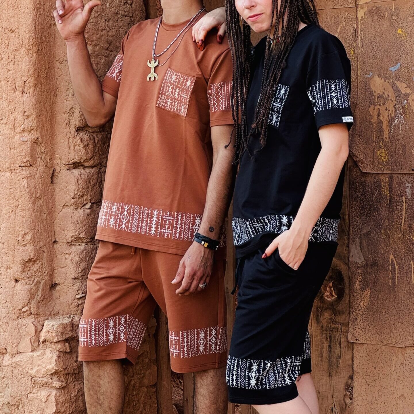 Black Moroccan Amazigh T-shirt and shorts set with white geometric embroidery and terracotta accents