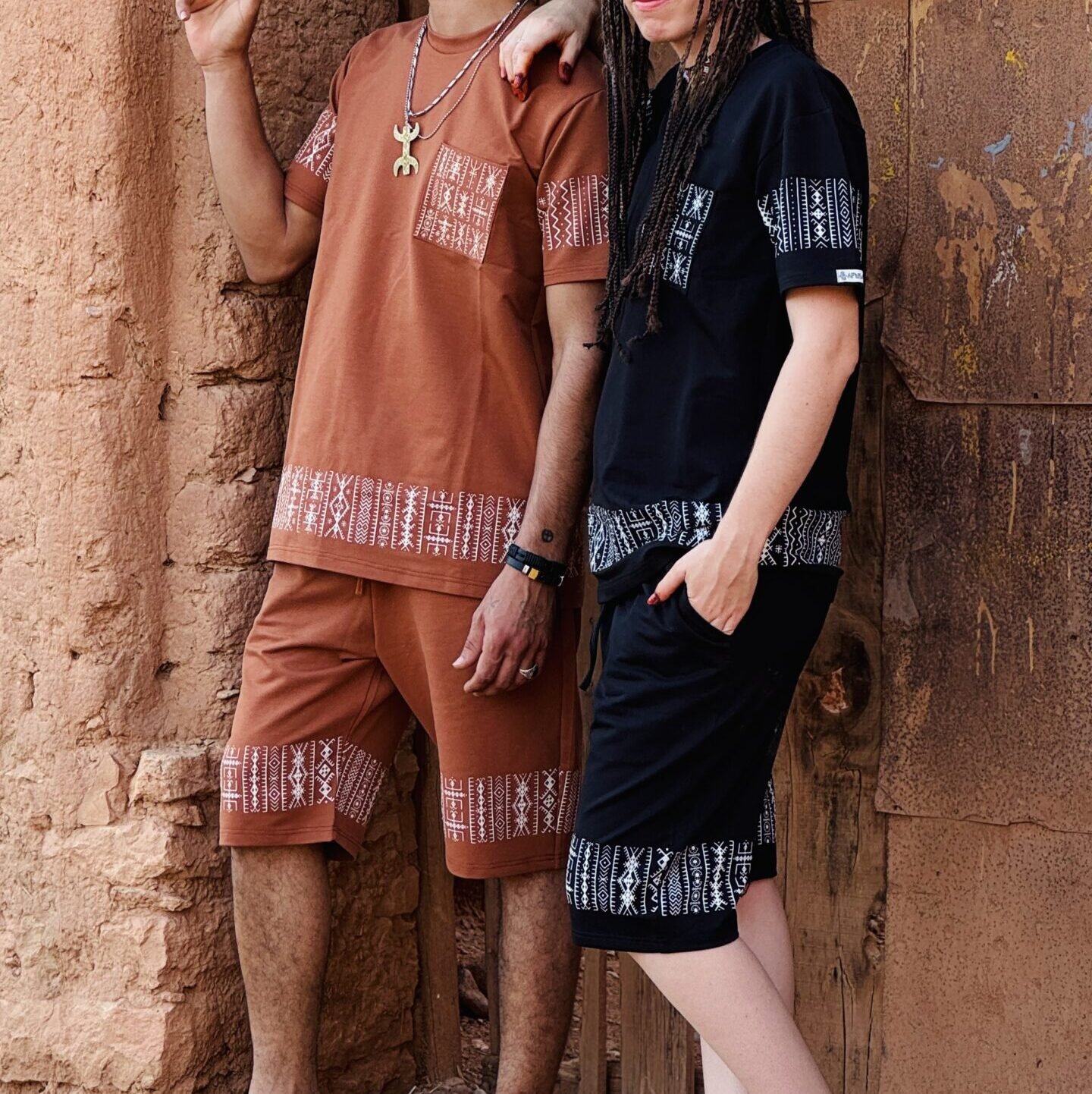 Black Moroccan Amazigh T-shirt and shorts set with white geometric embroidery and terracotta details
