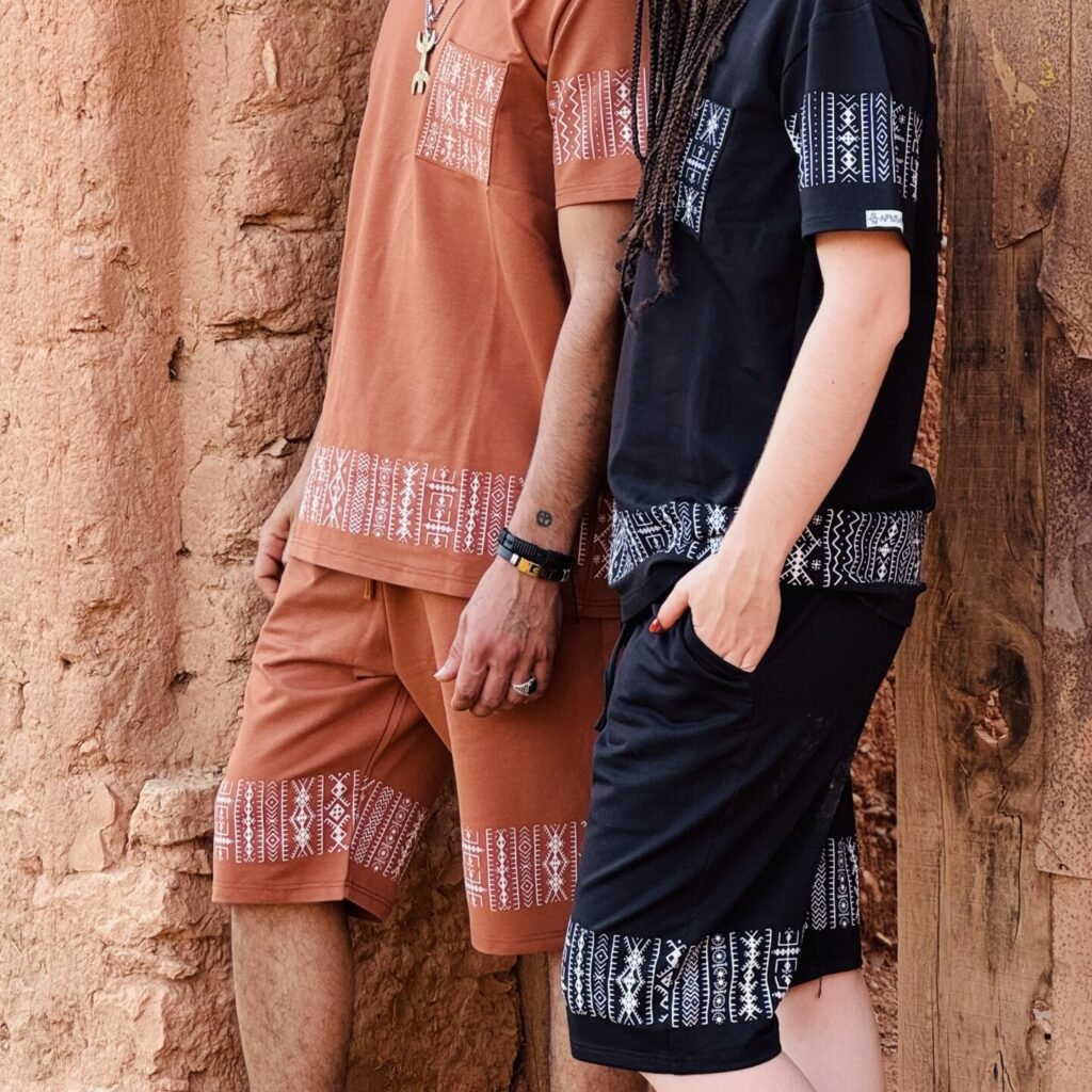 Black Moroccan Amazigh T-shirt and shorts set with white geometric embroidery and terracotta accents