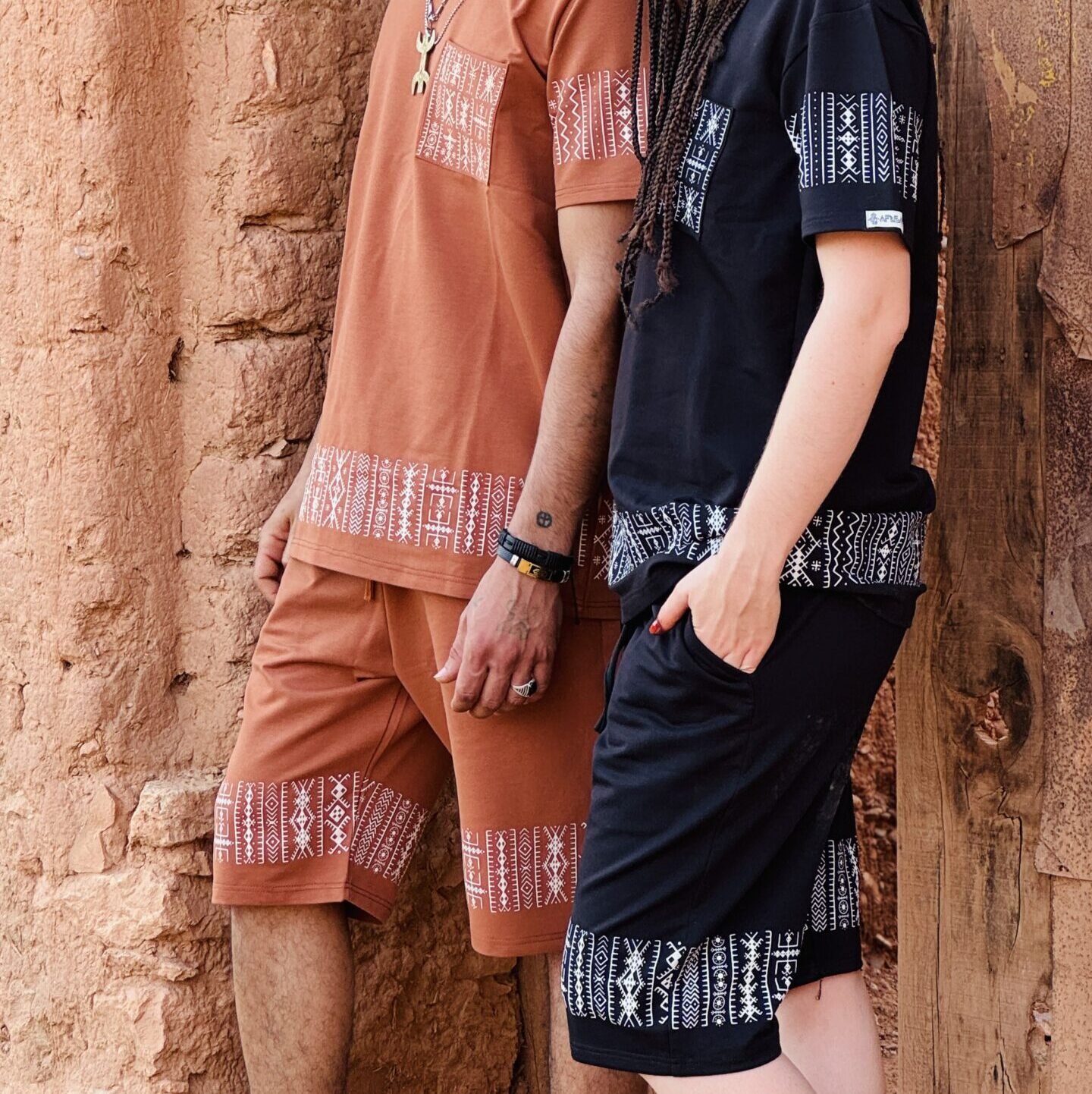 Black Moroccan Amazigh T-shirt and shorts set with white geometric embroidery and terracotta accents