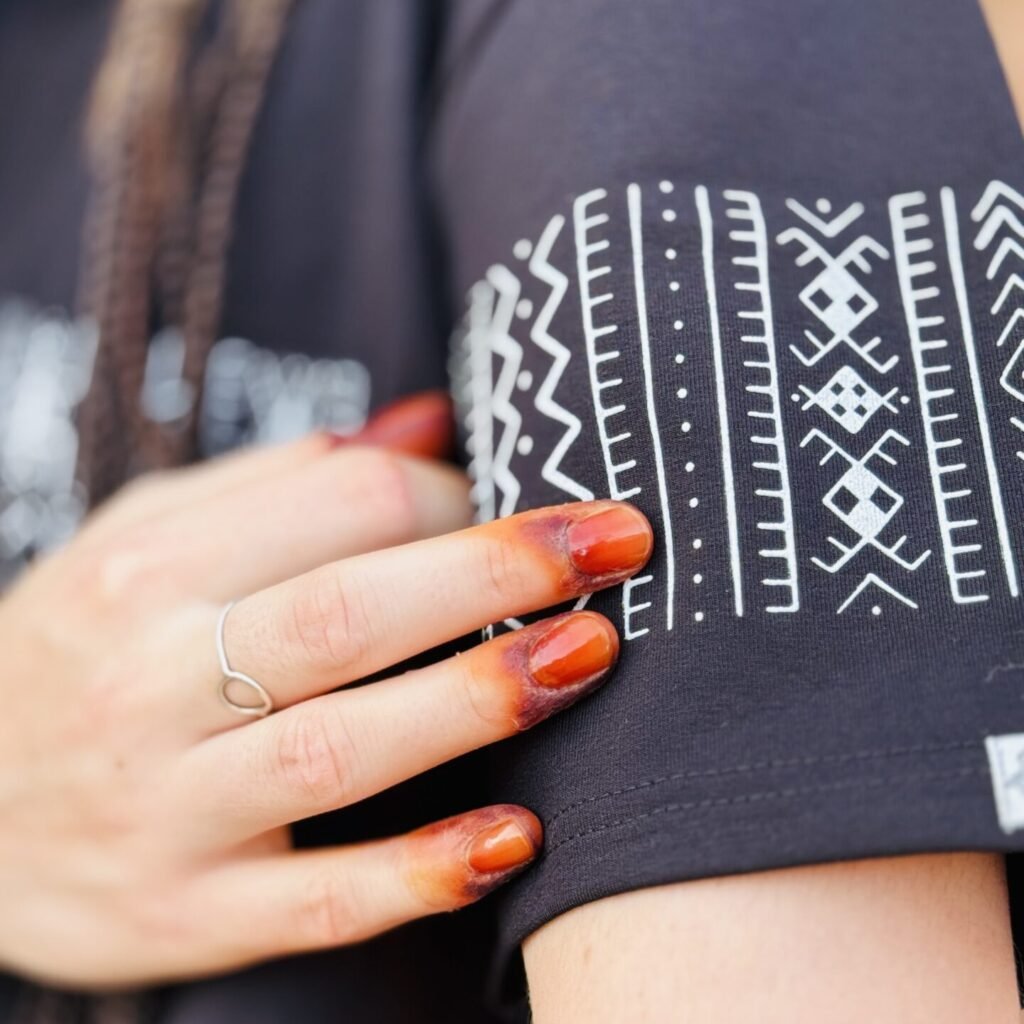 Black Moroccan Amazigh T-shirt with white geometric embroidery and traditional-inspired design details