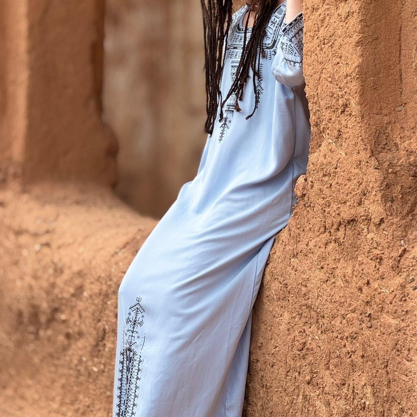 Light blue Amazigh embroidered Moroccan dress with black geometric patterns