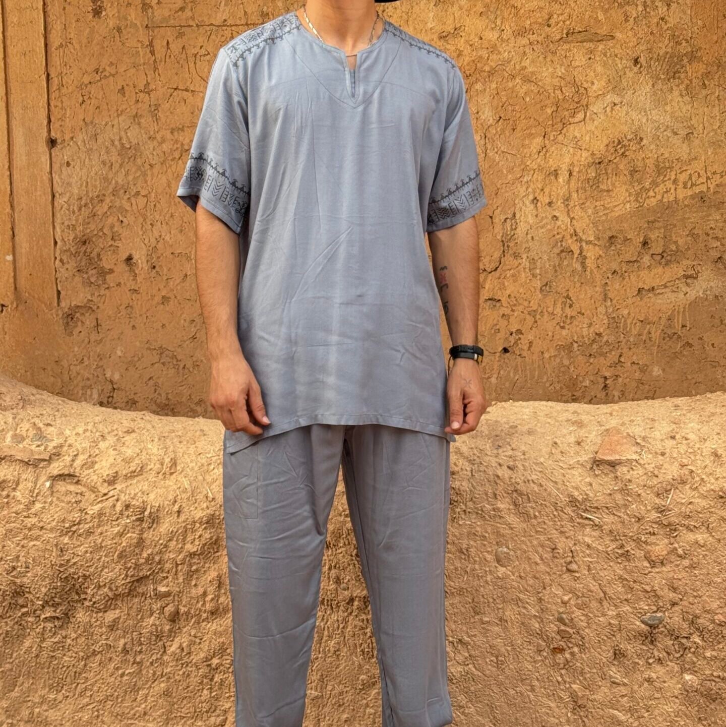 Gray Moroccan two-piece outfit with black geometric embroidery on the shirt and trousers