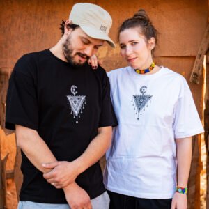 TASGHNST T-shirt featuring traditional Amazigh symbols and geometric Moroccan motifs