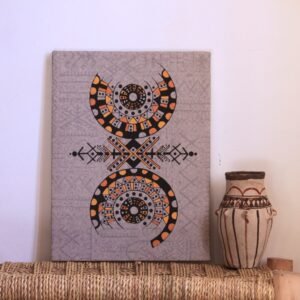 Illustration de Muha Tawargit inspirée du symbole amazigh Aza, composée de formes géométriques noires et de motifs colorés.