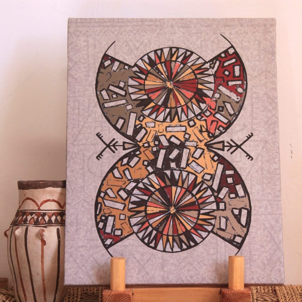 Illustration de Muha Tawargit inspirée du symbole amazigh Aza, composée de formes géométriques noires et de motifs colorés.